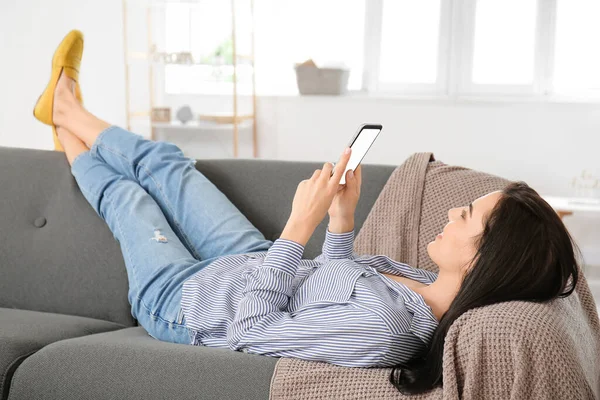 Young Woman Mobile Phone Relaxing Sofa Home — Stock Photo, Image