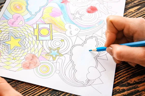 Woman Coloring Picture Table Closeup — Stock Photo, Image