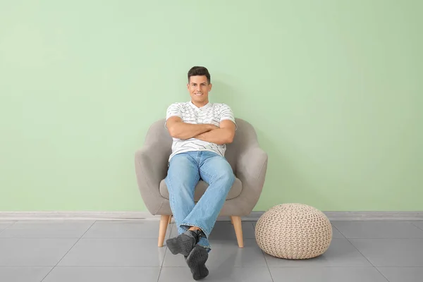 Young Man Relaxing Armchair Color Wall — Stock Photo, Image