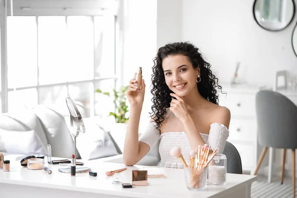 Beautiful Young Woman Applying Foundation Home — Stock Photo, Image