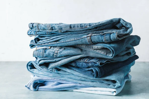 Stack Jeans Pants Table — Stock Photo, Image