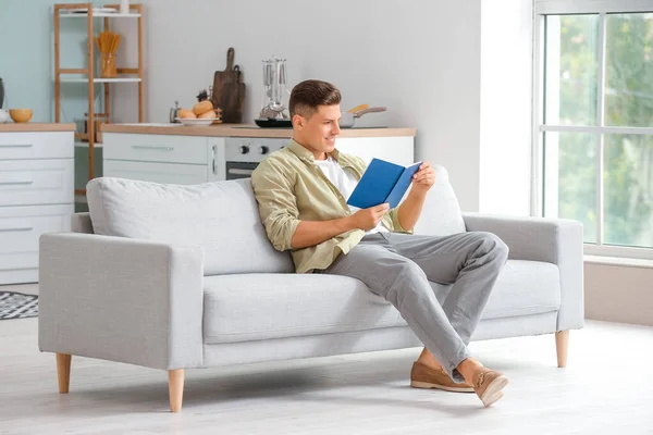 Young Man Book Relaxing Sofa Home — Stock Photo, Image