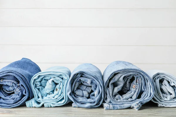 Rolled Jeans Pants Table — Stock Photo, Image