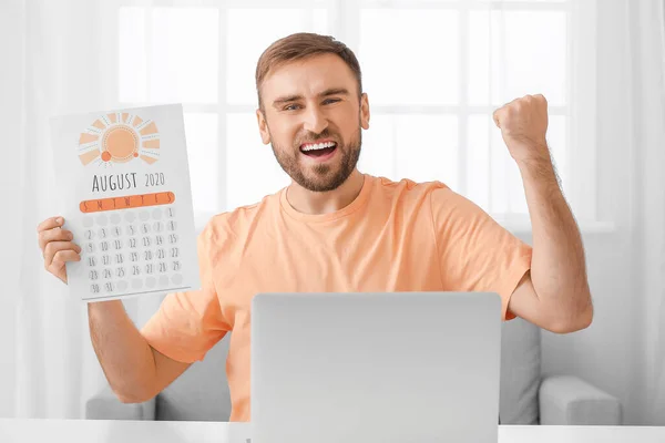 Happy Man Calendar Laptop Dreaming Vacation Home — Stock Photo, Image