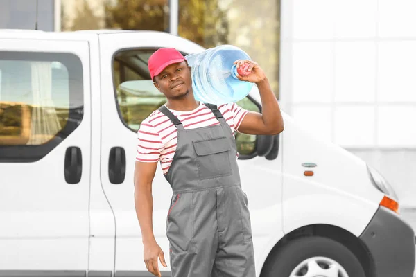 African American Delivery Man Bottle Water Car Outdoors — Stock Photo, Image