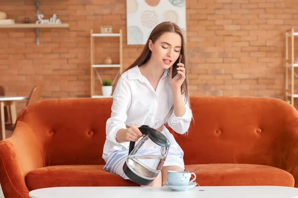 Woman Mobile Phone Pouring Hot Boiled Water Electric Kettle Cup — Stock Photo, Image