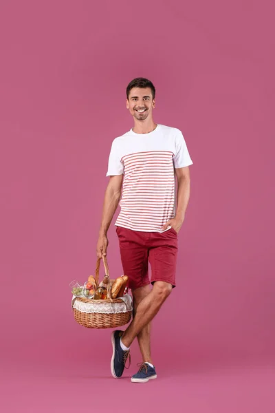Young Man Food Picnic Basket Color Background — Stock Photo, Image