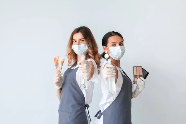 Female Makeup Artists Wearing Medical Masks Light Background Coronavirus Epidemic — Stock Photo, Image