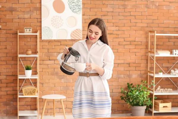 Woman Pouring Hot Boiled Water Electric Kettle Cup Home — Stock Photo, Image