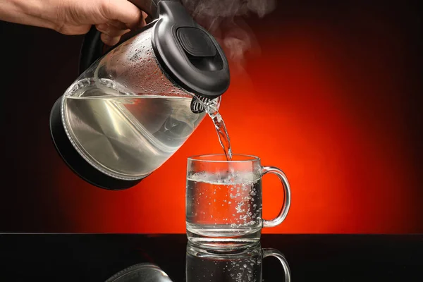 Pouring Hot Water Kettle Mug Color Background — Stock Photo, Image