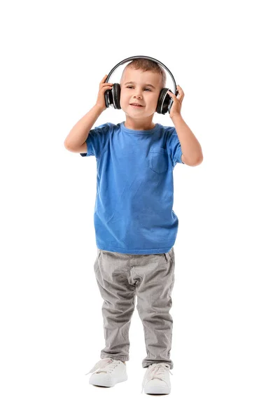 Lindo Niño Escuchando Música Sobre Fondo Blanco —  Fotos de Stock