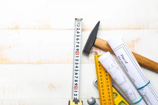 Measuring Tape Builder Supplies Blueprints Wooden Background — Stock Photo, Image