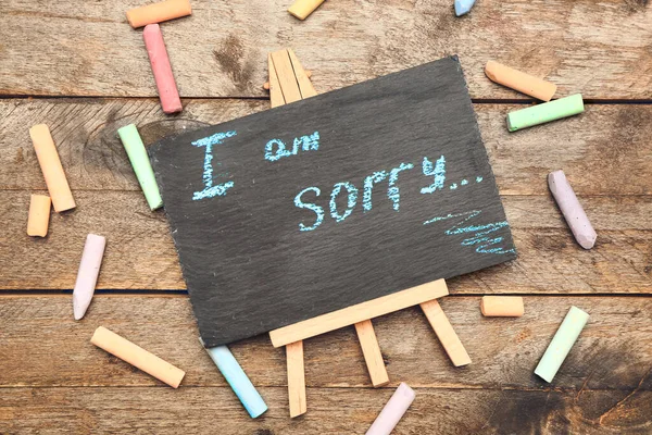 Krijtbord Met Tekst Sorry Houten Ondergrond — Stockfoto