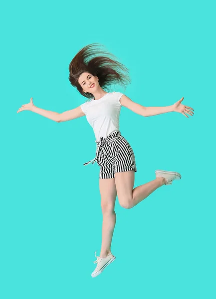 Jumping Young Woman Color Background — Stock Photo, Image
