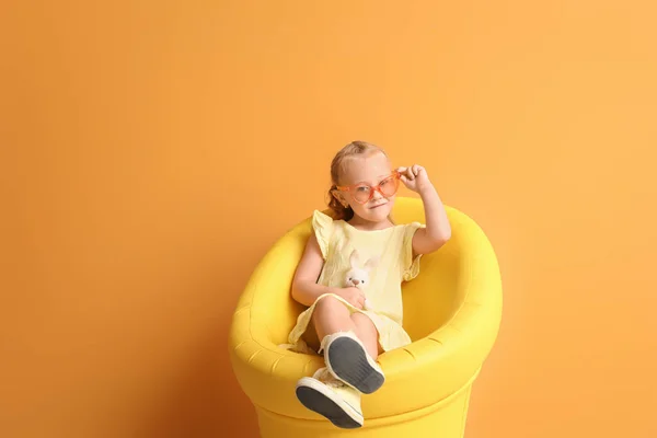 Cute Little Girl Sitting Armchair Color Background — Stock Photo, Image