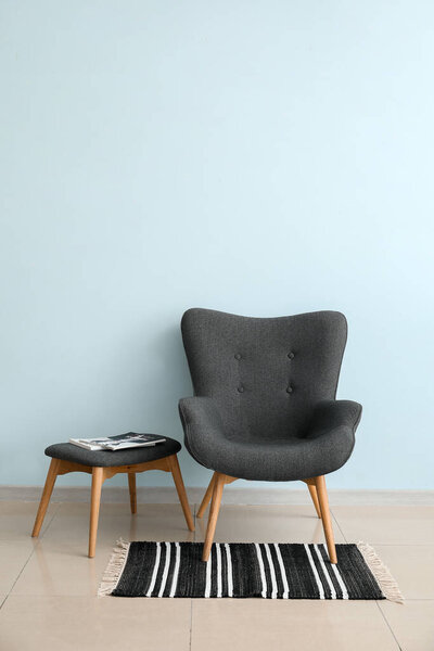 Modern armchair in interior of room