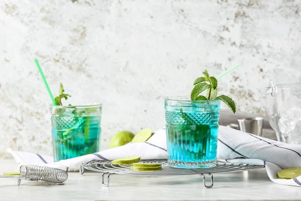 Glasses Tasty Blue Mojito Cocktail Light Background — Stock Photo, Image