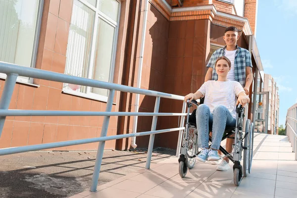Young Woman Wheelchair Her Husband Ramp Outdoors — Stock Photo, Image