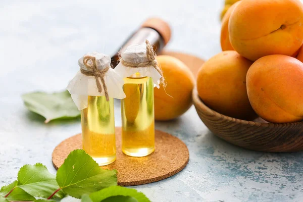 Bottles Apricot Essential Oil Color Background — Stock Photo, Image