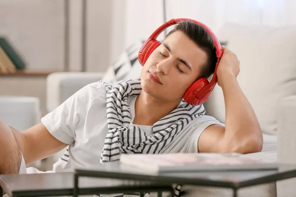 Sleepy Young Man Listening Music Home — Stock Photo, Image