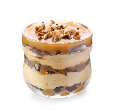 Beyaz arka planda kavanozda lezzetli kekler.