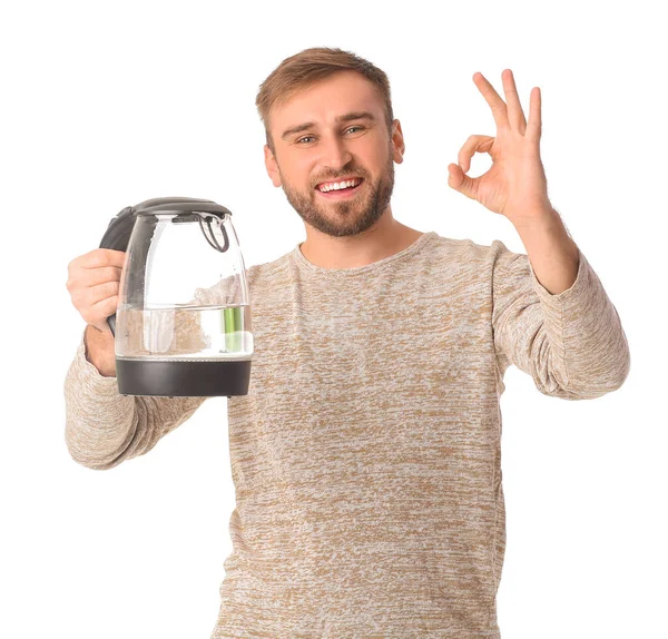 Jongeman Met Elektrische Waterkoker Toont Gebaar Witte Achtergrond — Stockfoto