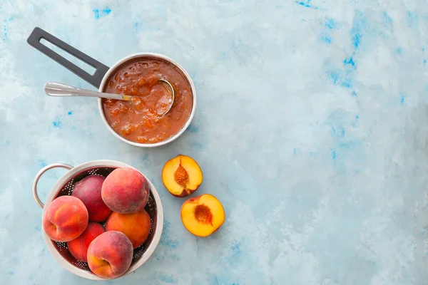 Saucepan Tasty Peach Jam Color Background — Stock Photo, Image
