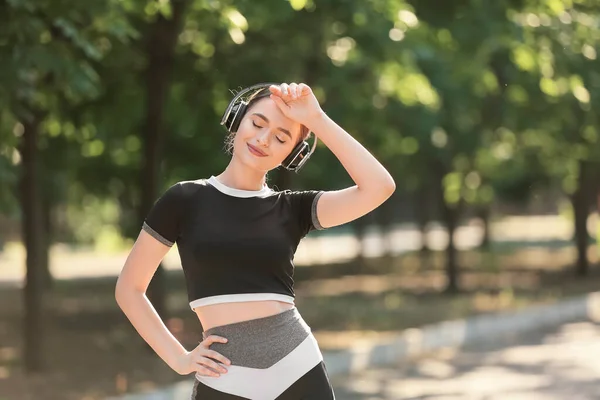 Sporty Young Woman Headphones Resting Running Outdoors — Stock Photo, Image