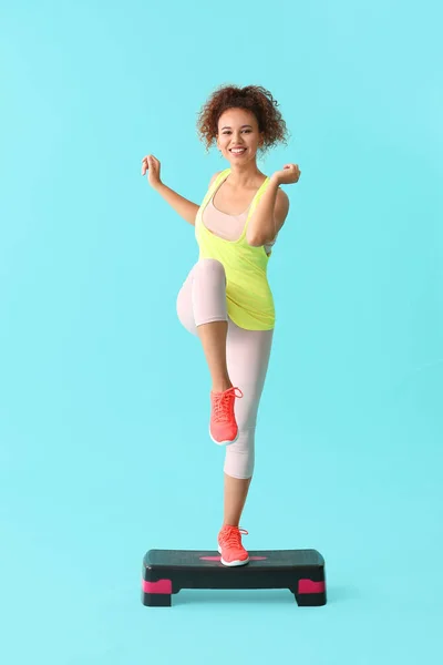 Young Woman Doing Aerobics Color Background — Stock Photo, Image