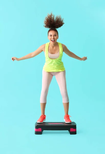 Young Woman Doing Aerobics Color Background — Stock Photo, Image