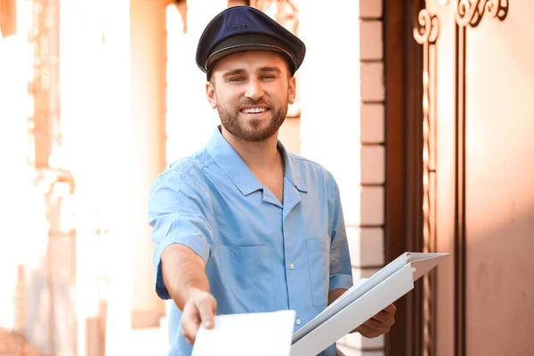 Handsome Young Postman Letters Outdoors — Stock Photo, Image