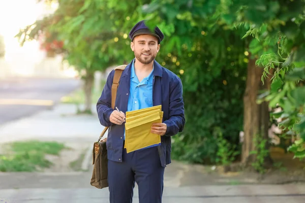 Handsome Young Postman Letters Outdoors — Stock Photo, Image