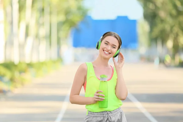 Sporty Young Woman Headphones Water Outdoors — Stock Photo, Image