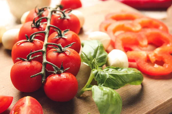Fresh Cherry Tomatoes Mozzarella Cheese Basil Table Closeup — Stock Photo, Image