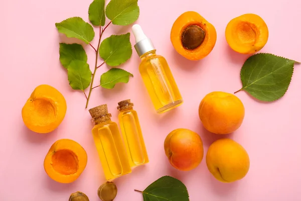 Bottles Apricot Essential Oil Color Background — Stock Photo, Image