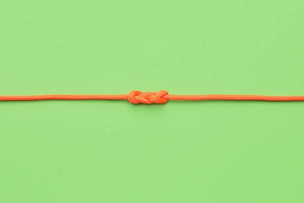 Seil Mit Knoten Auf Farbigem Hintergrund — Stockfoto