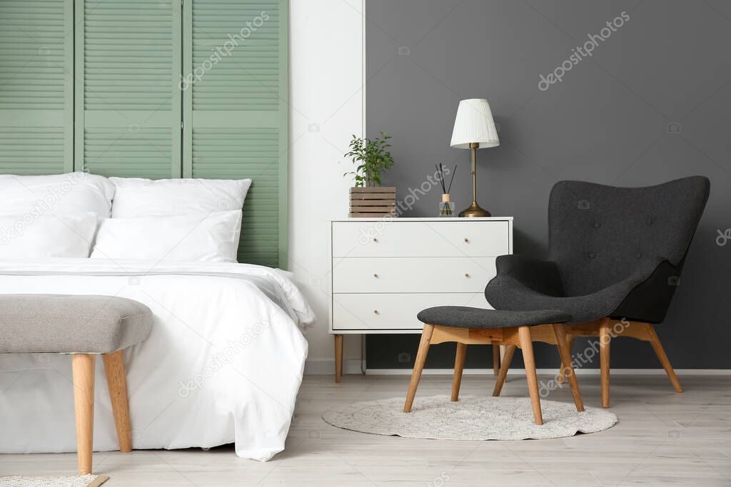 Interior of modern stylish room with armchair