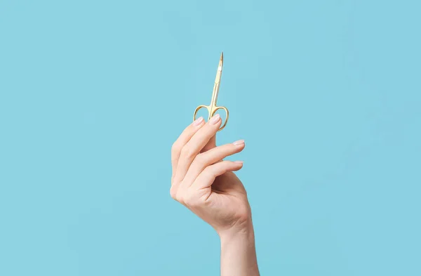 Female Hand Manicure Scissors Color Background — Stock Photo, Image