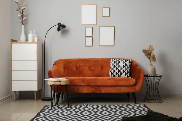 Interior of room with blank picture frames