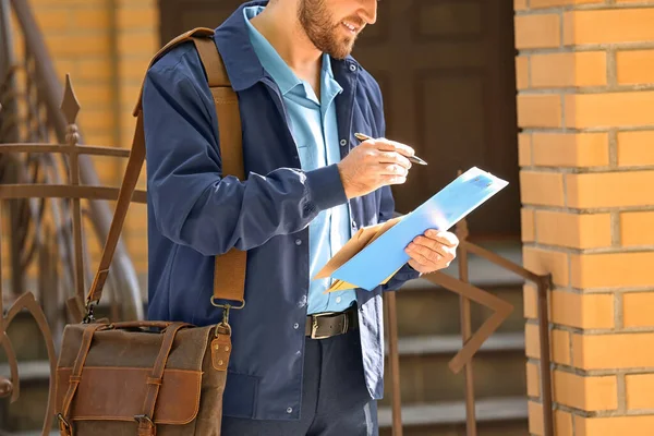 Handsome Young Postman Letters Outdoors — Stock Photo, Image