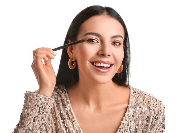 Beautiful Young Woman Applying Eyeshadows White Background — Stock Photo, Image