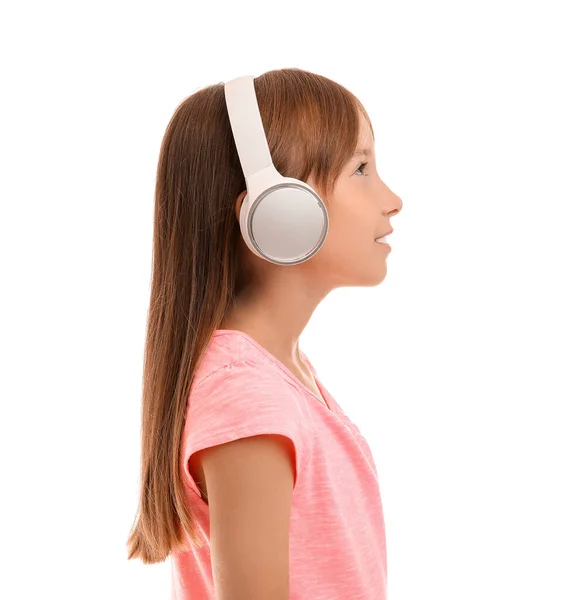 Küçük Kız Beyaz Arka Planda Müzik Dinliyor — Stok fotoğraf