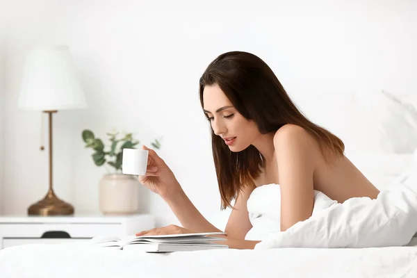 Seductive Woman Drinking Coffee Reading Book Bed Home — Stock Photo, Image