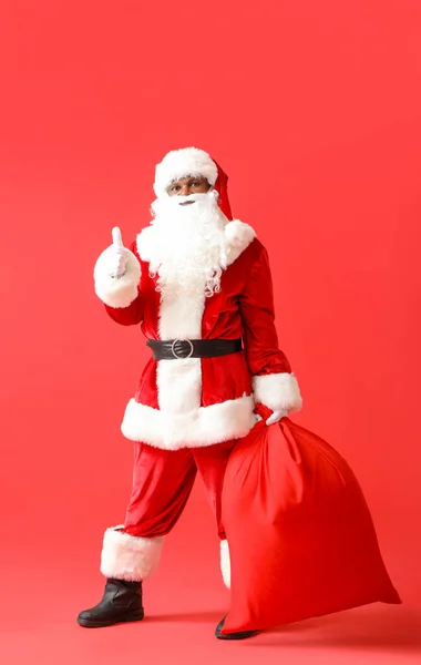 African American Santa Claus Bag Color Background — Stock Photo, Image