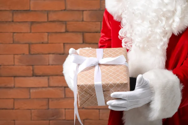 Santa Claus Gift Brick Background Closeup — Stock Photo, Image