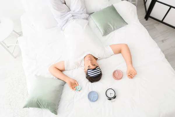 Young Man Alarm Clocks Suffering Insomnia Bedroom — Stock Photo, Image