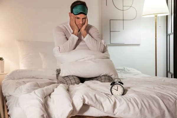 Young Man Alarm Clock Suffering Insomnia Bedroom — Stock Photo, Image