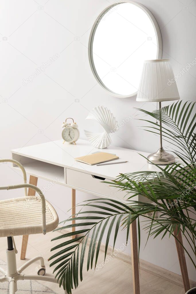 Stylish interior of room with mirror and table