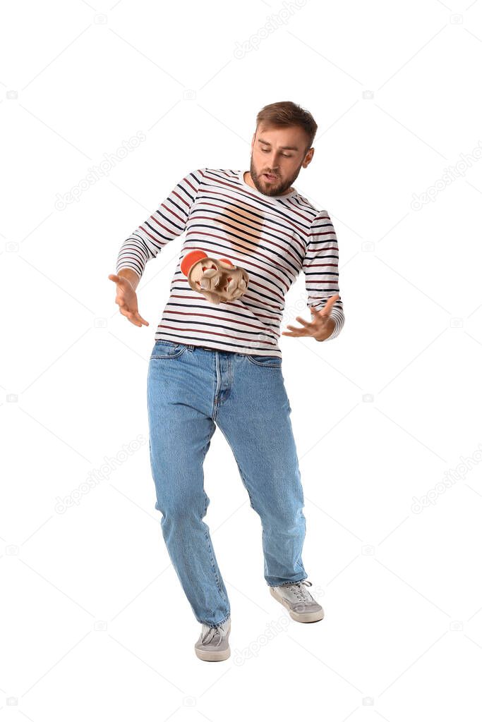 Stressed young man dropping cups of coffee on white background