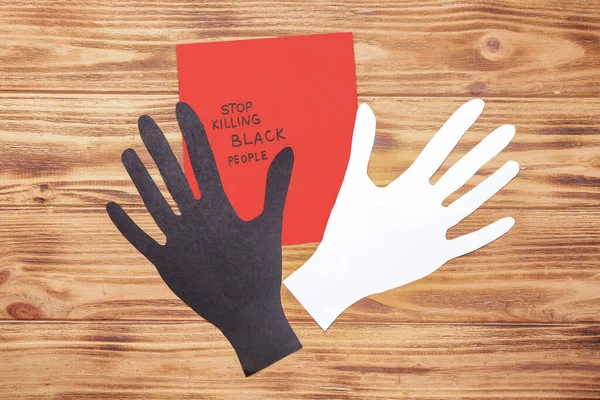 Paper Hands Paper Sheet Text Stop Killing Black People Wooden — Stock Photo, Image